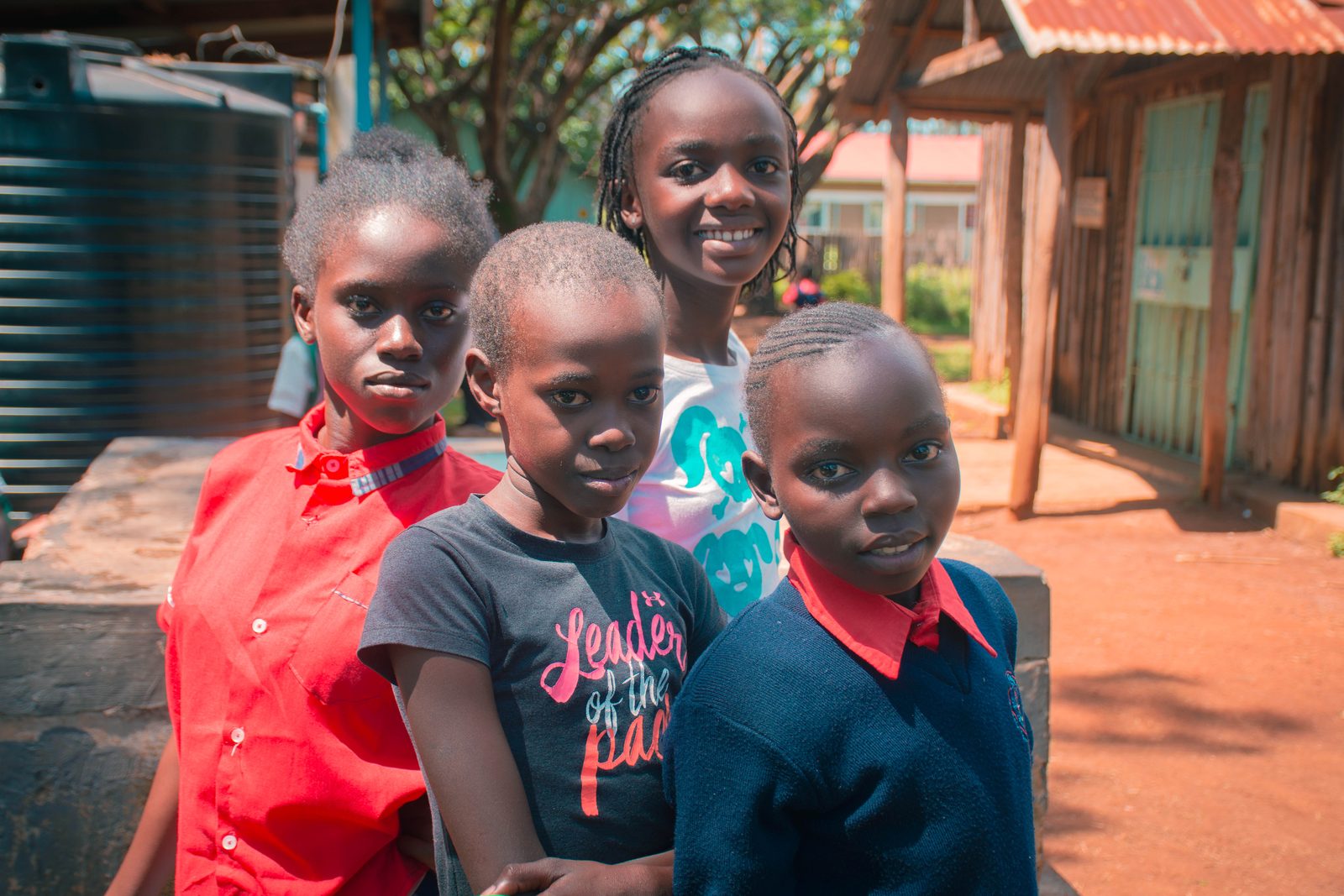 Children supported by Hearts of Love Africa smiling together